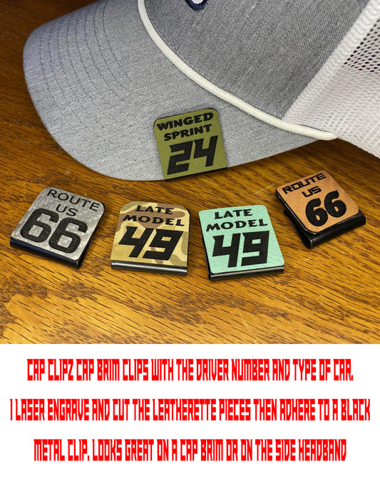 Cap clips with driver number and car type on a cap brim, Leatherette Material adhered on a metal surface.
